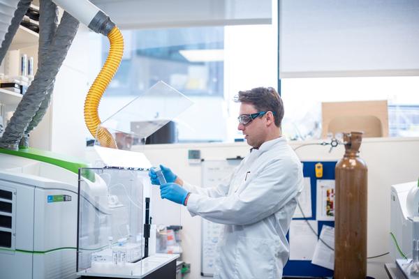 Photograph of a researcher working in the ICP-MS lab