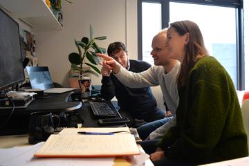 Researchers in discussion